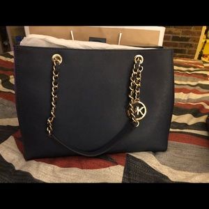 Brand New Authentic Michael Kors Purses & wallet